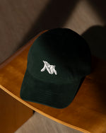 Photo Image of Verdin Dog Care Cotton Baseball Hat Sitting on a Wood Bench
