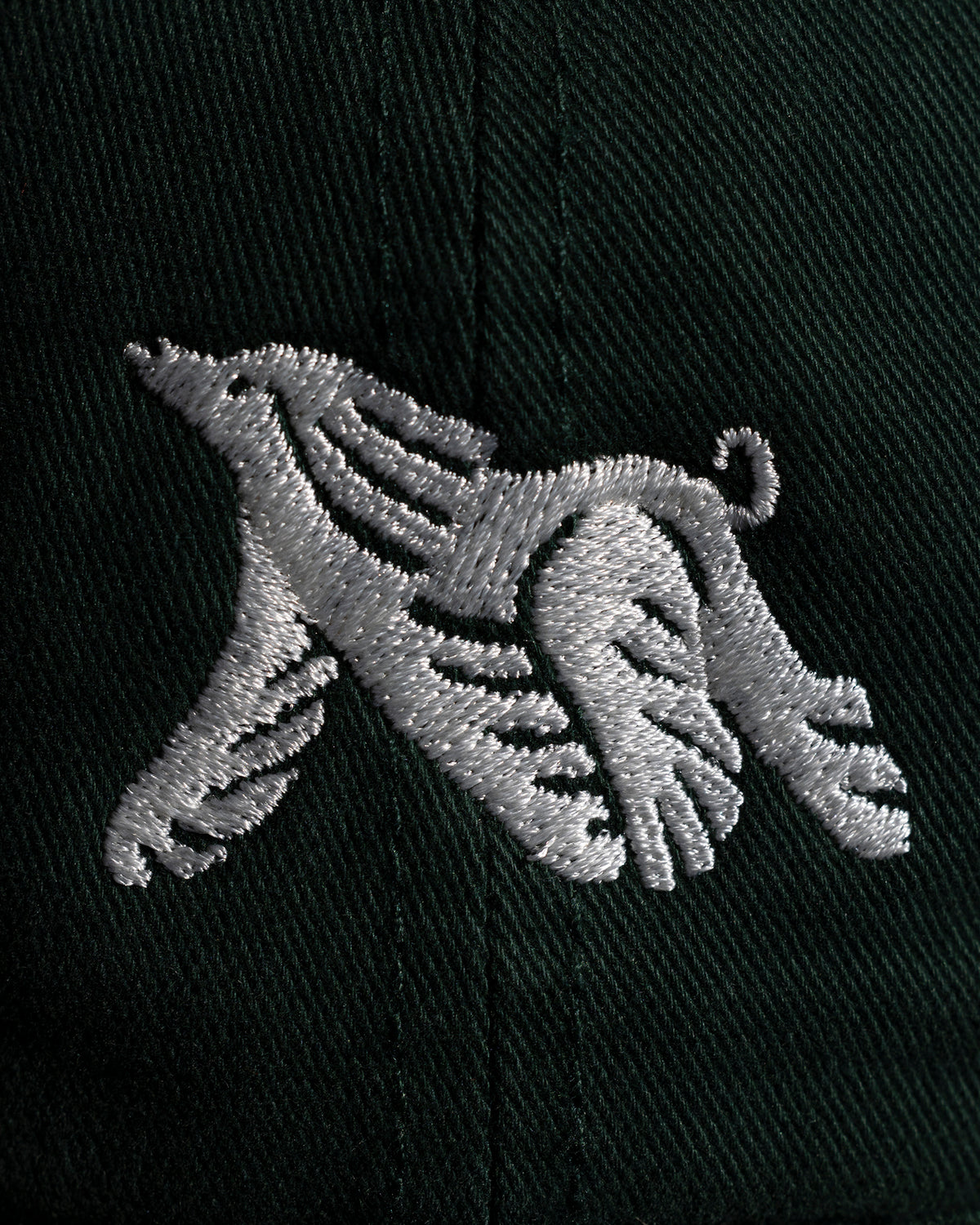 Verdin Dog Care Cotton Baseball Hat Close-Up on Embroidered Logo of a Dog